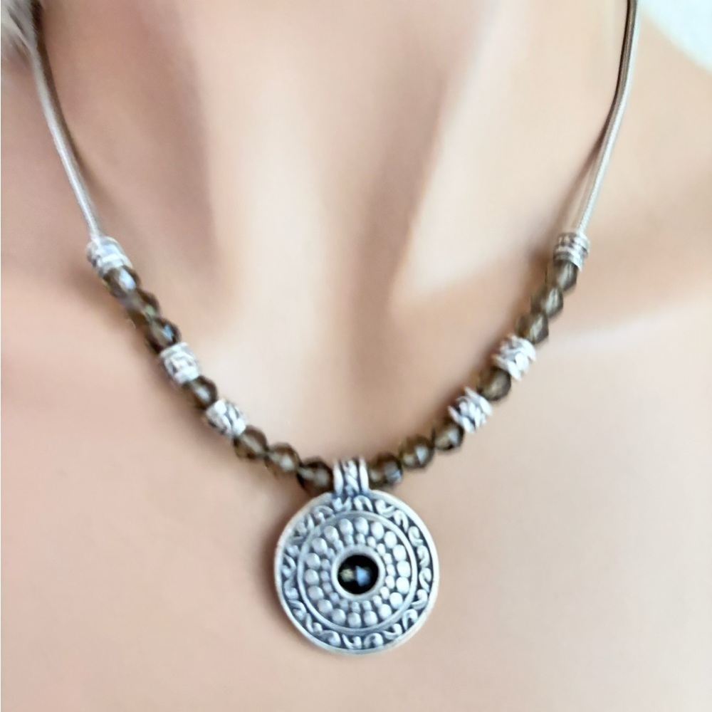 Brighton "Night Mist" smoky quartz necklace.  It features silver-plated accents.